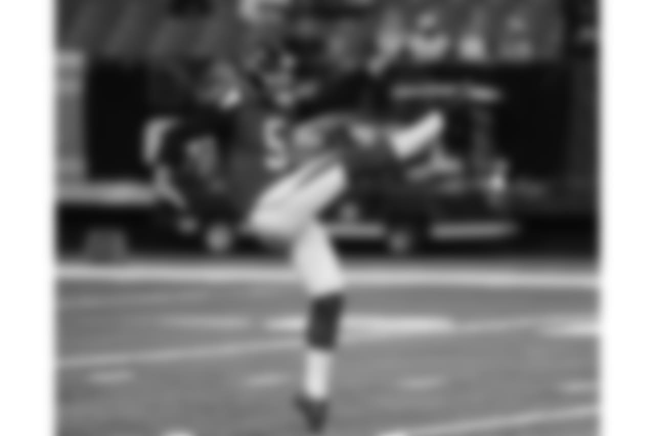 Atlanta Falcons punter Matt Bosher (5) kicks against the Washington Redskins Thursday, Aug. 11, 2016 in a pre-season NFL opening game in Atlanta. The Falcons won 23 - 17. (Al Messerschmidt via AP)