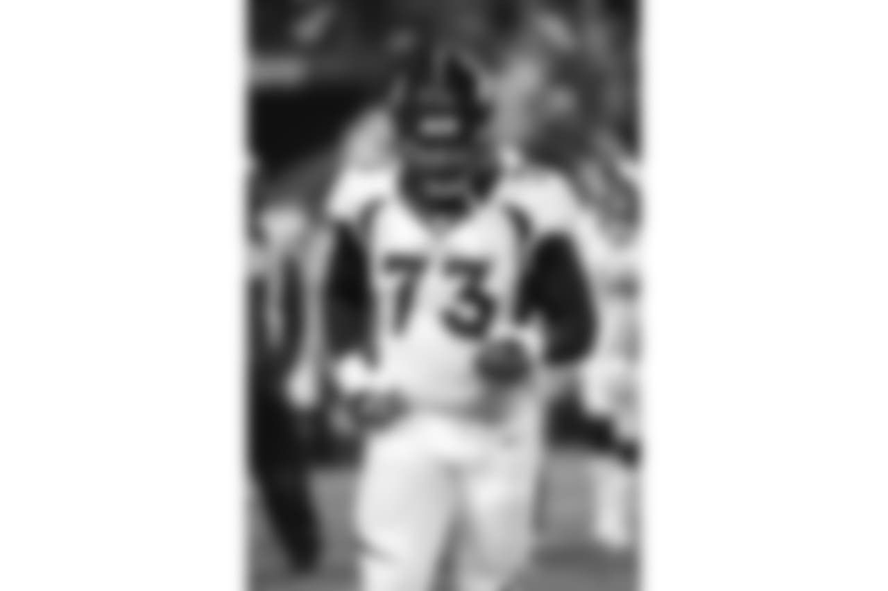 Denver Broncos offensive tackle Russell Okung runs to the sidelines in action against the Kansas City Chiefs during a NFL football game on Sunday, Dec. 25, 2016, in Kansas City, Mo. The Chiefs won, 33-10. (G. Newman Lowrance via AP)