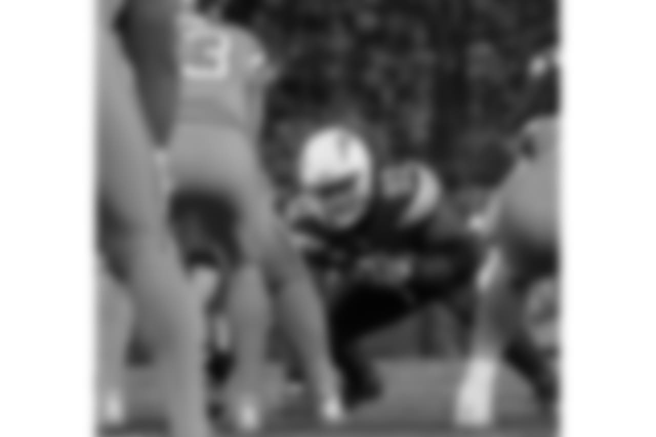 Chargers win 21-13 against the Denver Broncos at Qualcomm Stadium.