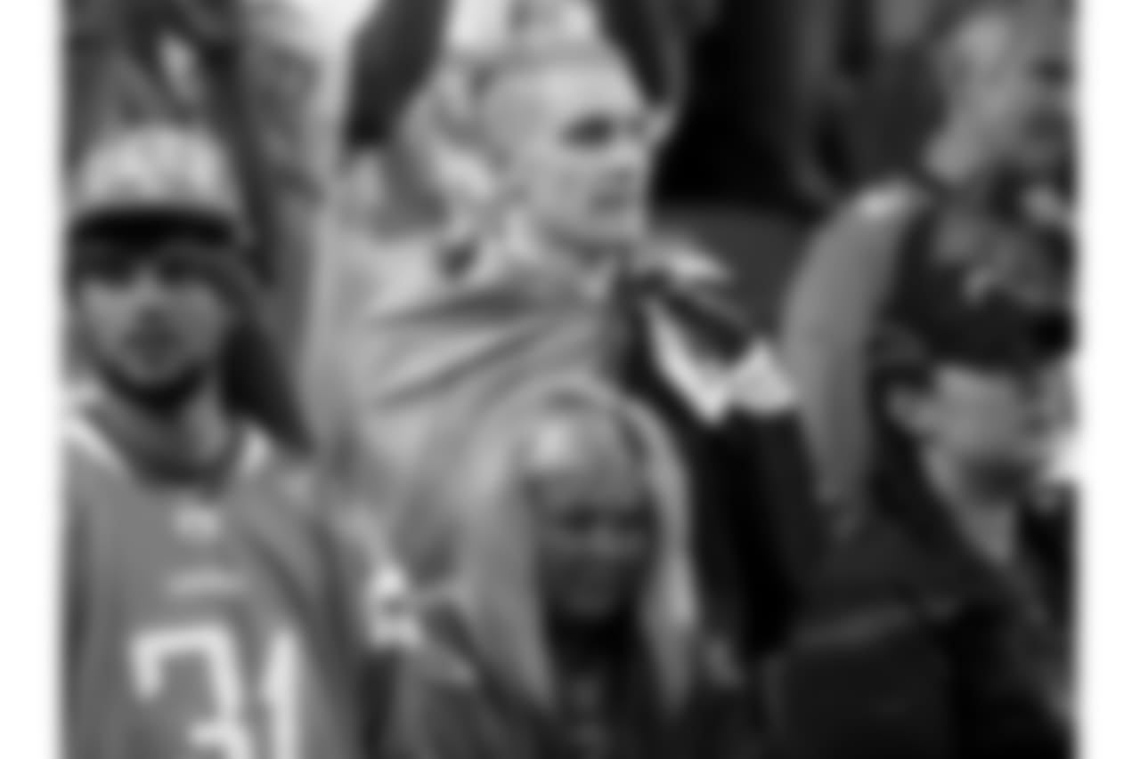 Los Angeles Chargers fans watch prior to an NFL football game against the Denver Broncos, Monday, Sept. 11, 2017, in Denver. (AP Photo/David Zalubowski)