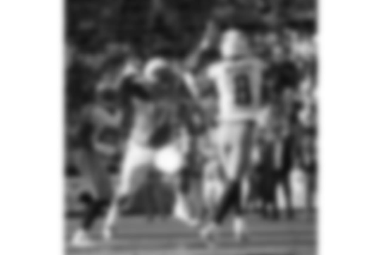 Chargers win 43-35 against the Tennessee Titans at Qualcomm Stadium