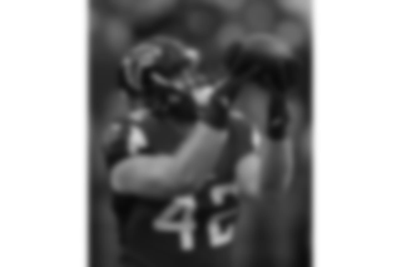 Atlanta Falcons fullback Patrick DiMarco (42) warms up before the first half of an NFL football game between the Atlanta Falcons and the Tampa Bay Buccaneers, Sunday, Sept. 11, 2016, in Atlanta. (AP Photo/John Bazemore)