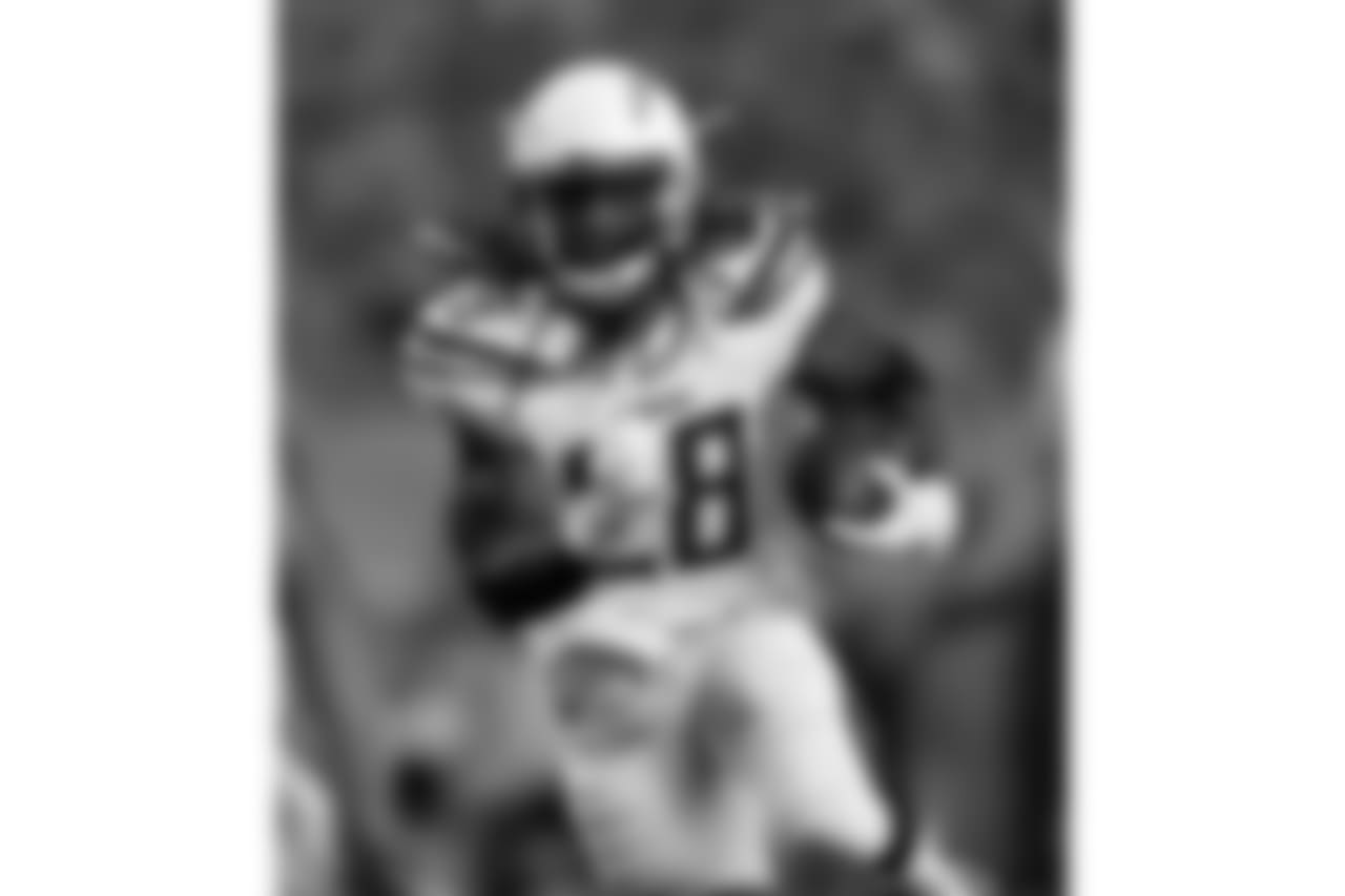 Los Angeles Chargers running back Melvin Gordon (28) runs against the Denver Broncos during the first half of an NFL football game, Monday, Sept. 11, 2017, in Denver. (AP Photo/David Zalubowski)