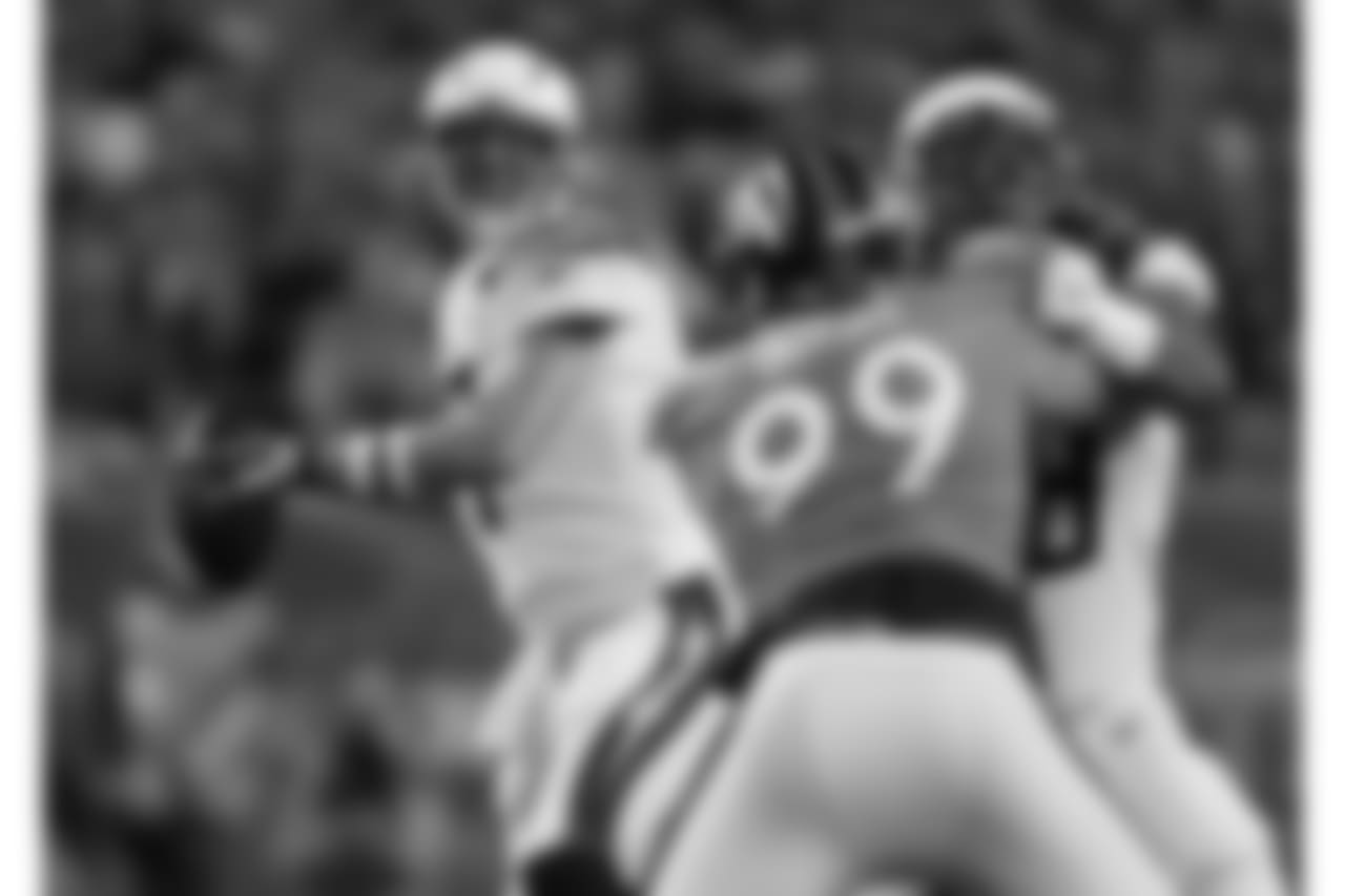 Los Angeles Chargers quarterback Philip Rivers (17) throws against the Denver Broncos during the first half of an NFL football game, Monday, Sept. 11, 2017, in Denver. (AP Photo/David Zalubowski)