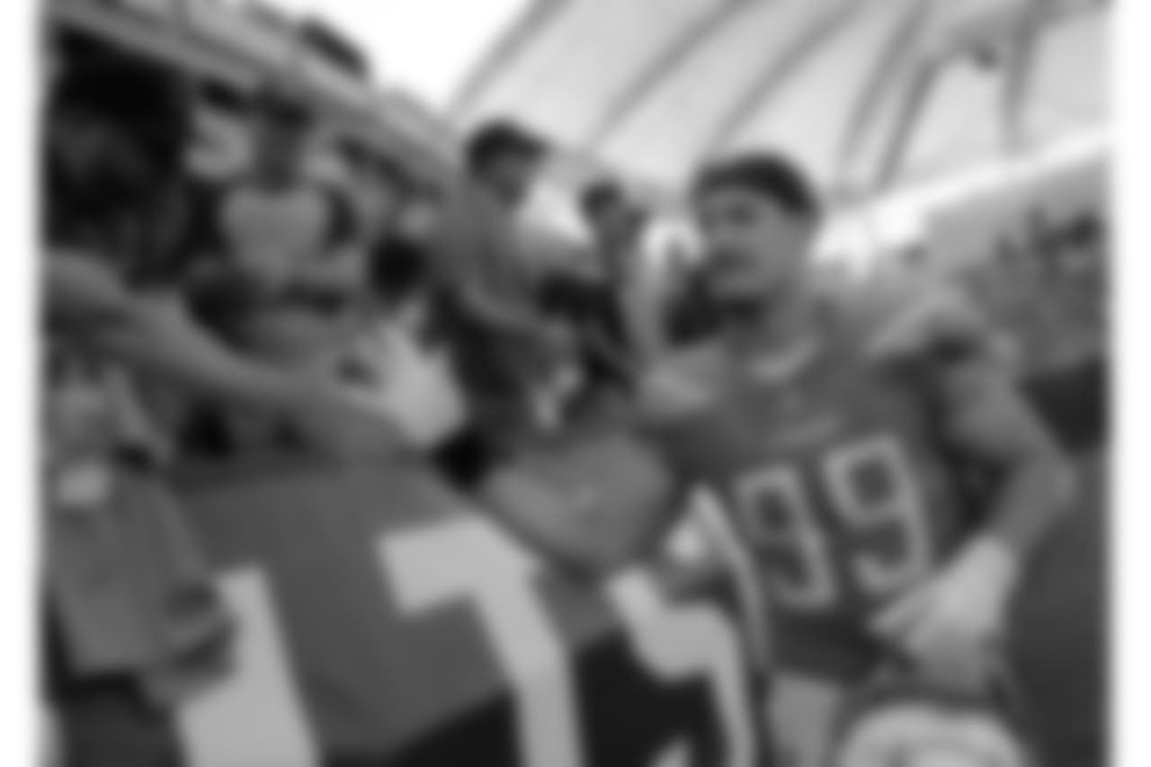 Los Angeles Chargers defensive end Joey Bosa greets fans after their win against the Denver Broncos during an NFL football game Sunday, Oct. 22, 2017, in Carson, Calif. (AP Photo/Jae C. Hong)