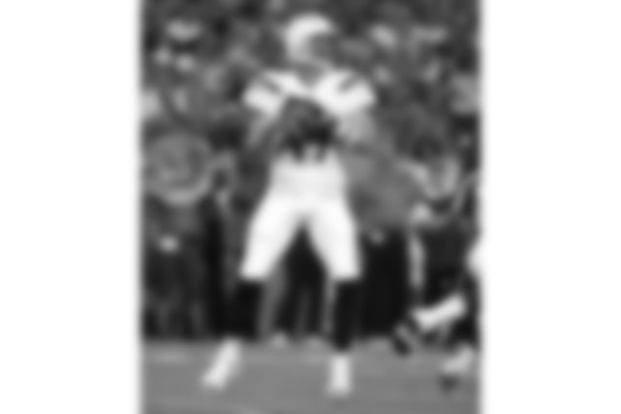 Los Angeles Chargers quarterback Philip Rivers (17) looks to throw against the Denver Broncos during the first half of an NFL football game, Monday, Sept. 11, 2017, in Denver. (AP Photo/Jack Dempsey)