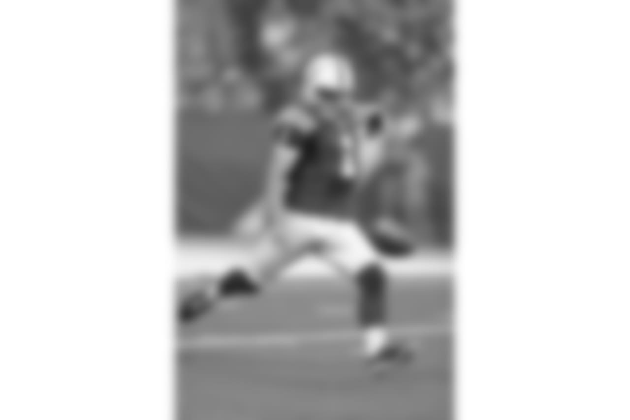 Indianapolis Colts punter Pat McAfee (1) punts to the Philadelphia Eagles during the first half of an NFL preseason football game in Indianapolis, Saturday, Aug. 27, 2016. (AP Photo/Darron Cummings)