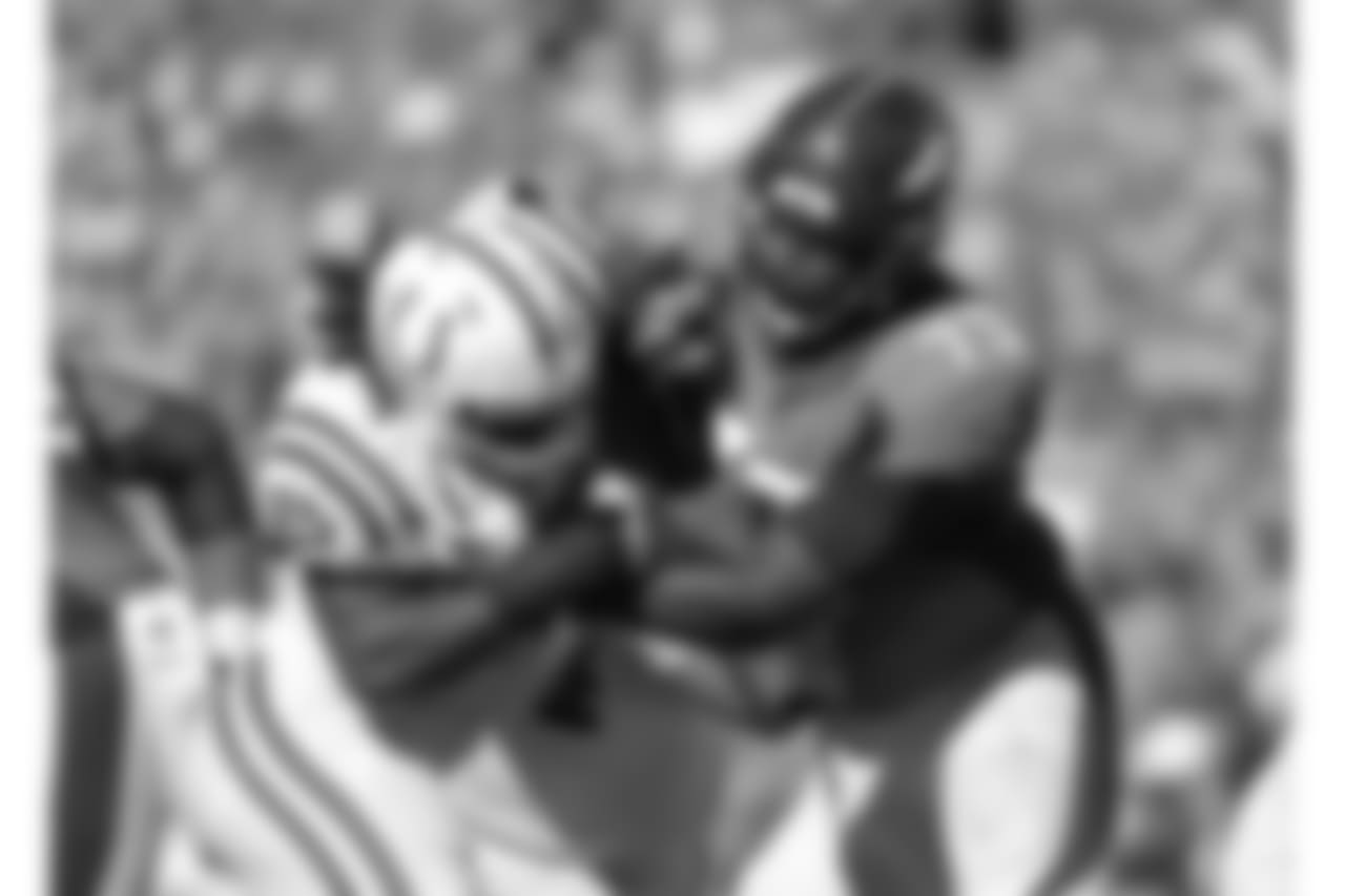 Denver Broncos offensive lineman Russell Okung (73) blocks during an NFL game against the Indianapolis Colts on Sunday, Sept. 18, 2016, in Denver, Co. The Broncos won the game, 34-20. (Greg Trott via AP)