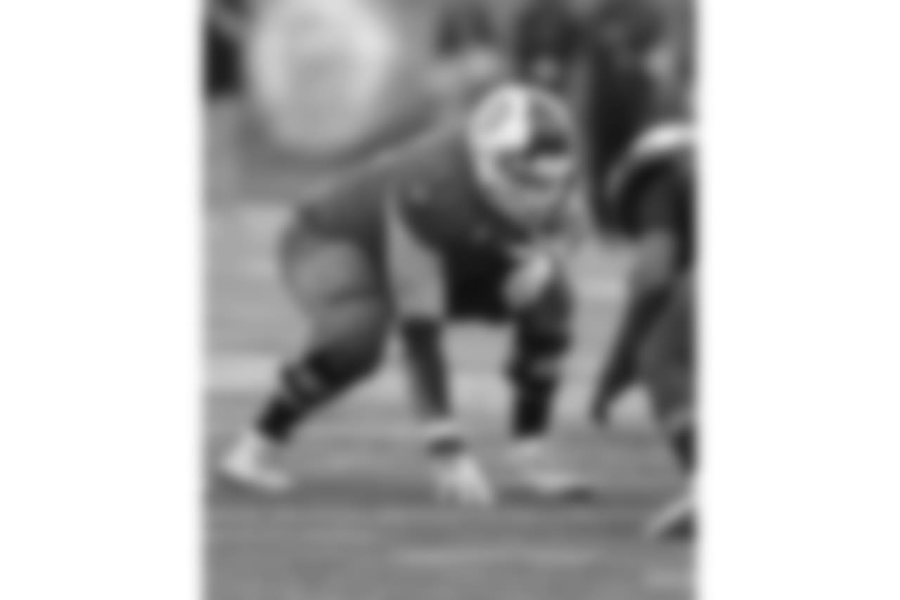 North squad offensive guard Dan Feeney of Indiana (67) lines up for a play during the second half of the Senior Bowl NCAA college football game, Saturday, Jan. 28, 2017, at Ladd-Peebles Stadium in Mobile, Ala. (AP Photo/Butch Dill)