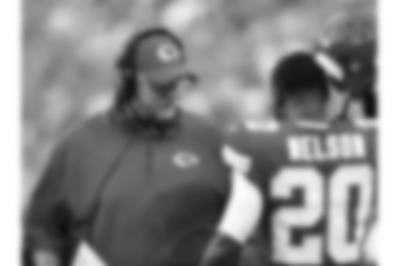 Andy Reid talks to Kansas City Chiefs cornerback Steven Nelson (20) during Texans at Chiefs at Arrowhead Stadium on 8/9/18.