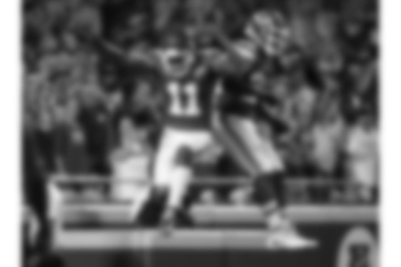 Kansas City Chiefs wide receiver Demarcus Robinson (11) and Kansas City Chiefs running back Damien Williams (26) celebrate during Texans at Chiefs at Arrowhead Stadium on 8/9/18.