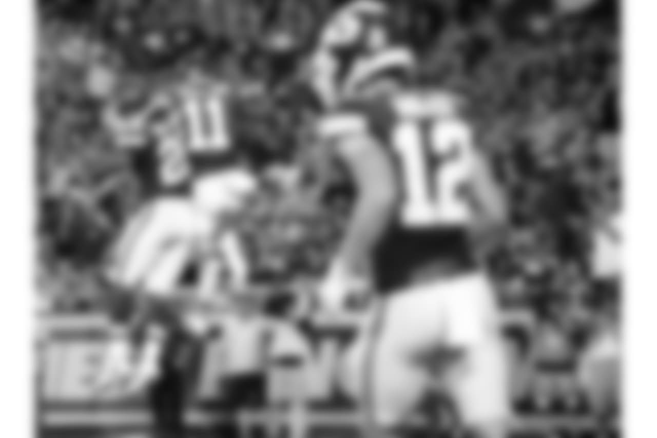 Kansas City Chiefs wide receiver Demarcus Robinson (11) and Kansas City Chiefs running back Damien Williams (26) celebrate during Texans at Chiefs at Arrowhead Stadium on 8/9/18.
