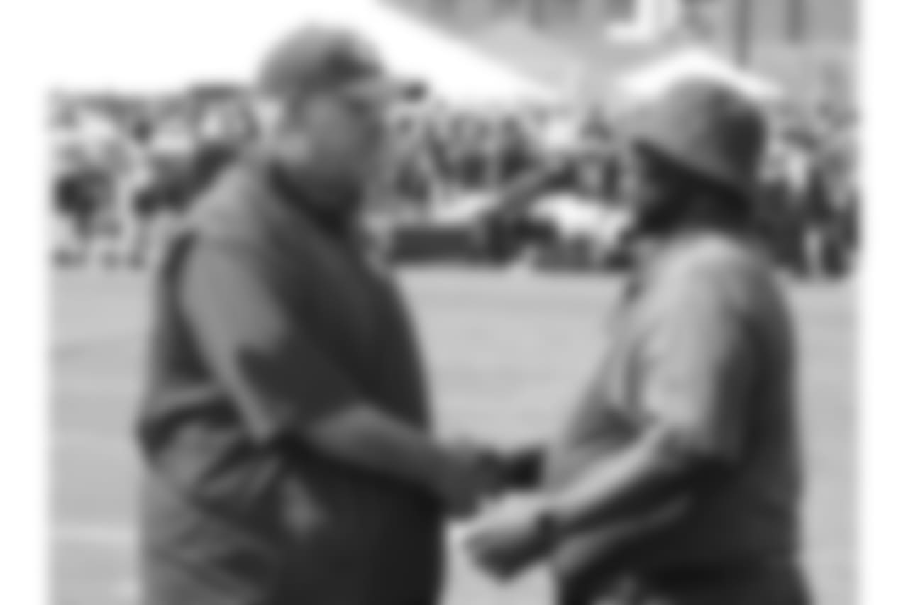 Andy Reid and Mayor Sly James after practice 8/4/18 at Chiefs Training Camp at Missouri Western State University in St Joseph, Missouri