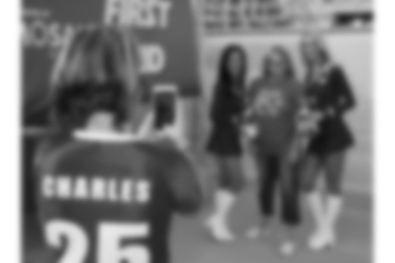 Fans get their photo taken with Chiefs Cheerleaders during practice on 8/4/18 at Chiefs Training Camp at Missouri Western State University in St. Joseph, Missouri.