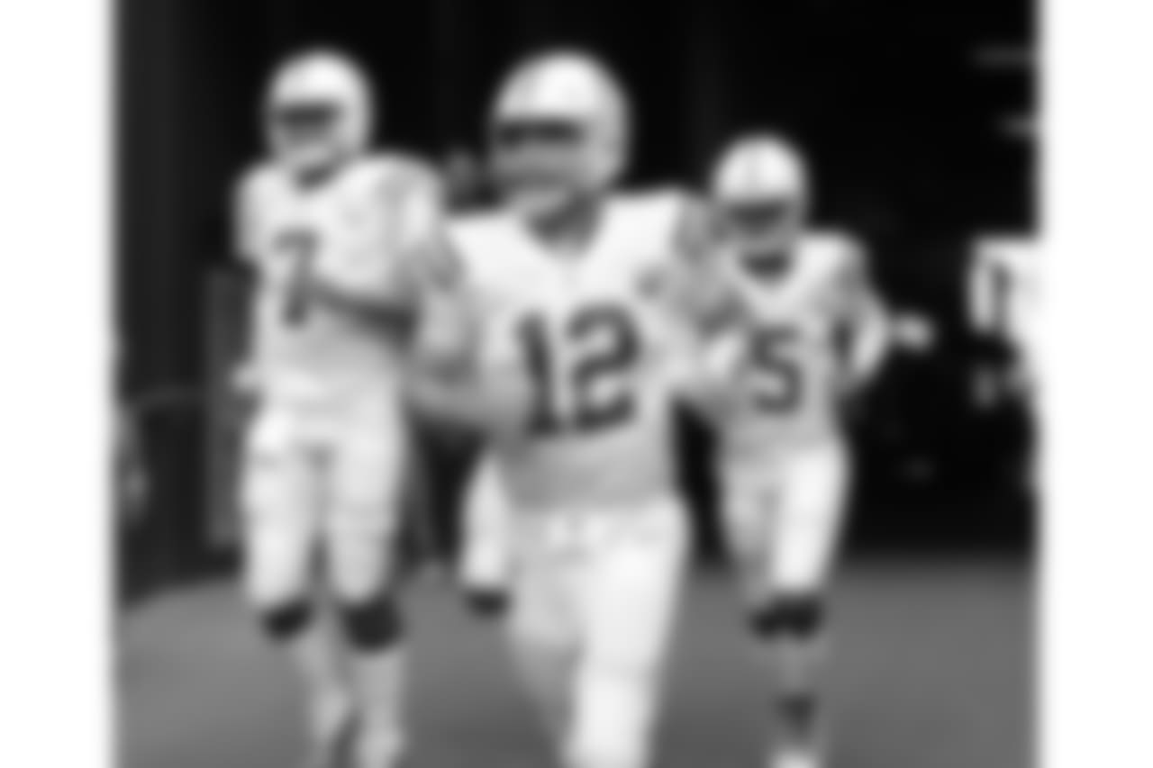 Indianapolis Colts quarterback Andrew Luck (12) jogs out of the tunnel with his backups during warmups before an NFL football preseason game against the Seattle Seahawks, Thursday, Aug. 9, 2018, in Seattle. (AP Photo/Stephen Brashear)