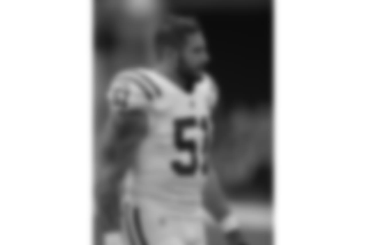 Indianapolis Colts defensive end John Simon stands on the field before an NFL football preseason game against the Seattle Seahawks, Thursday, Aug. 9, 2018, in Seattle. (AP Photo/Stephen Brashear)
