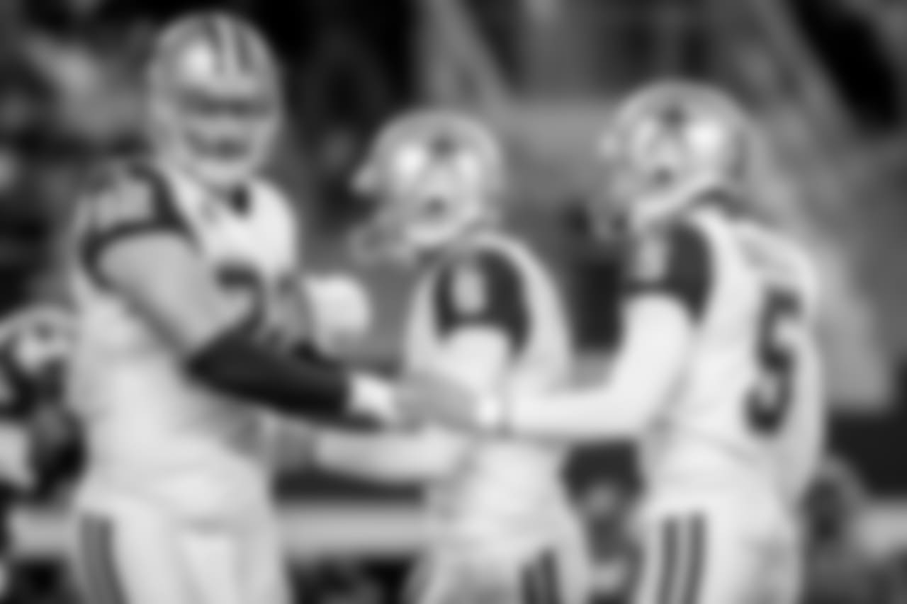 Dallas Cowboys place kicker Dan Bailey (5) and tight end Jason Witten (82) celebrate during a week 13 NFL football game against the Washington Redskins on Thursday, Nov. 30, 2017 in Arlington, Texas. Dallas won 38-14. (Aaron M. Sprecher via AP)