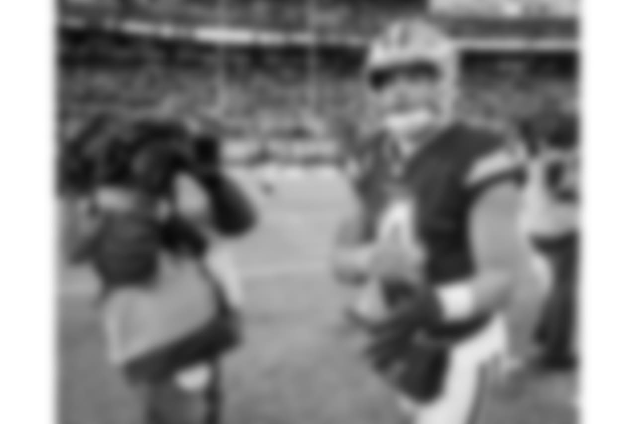 Dallas Cowboys quarterback Dak Prescott (4) walks off the field after beating the New York Giants 30-10 in an NFL football game, Sunday, Dec. 10, 2017, in East Rutherford, N.J. (AP Photo/Bill Kostroun)