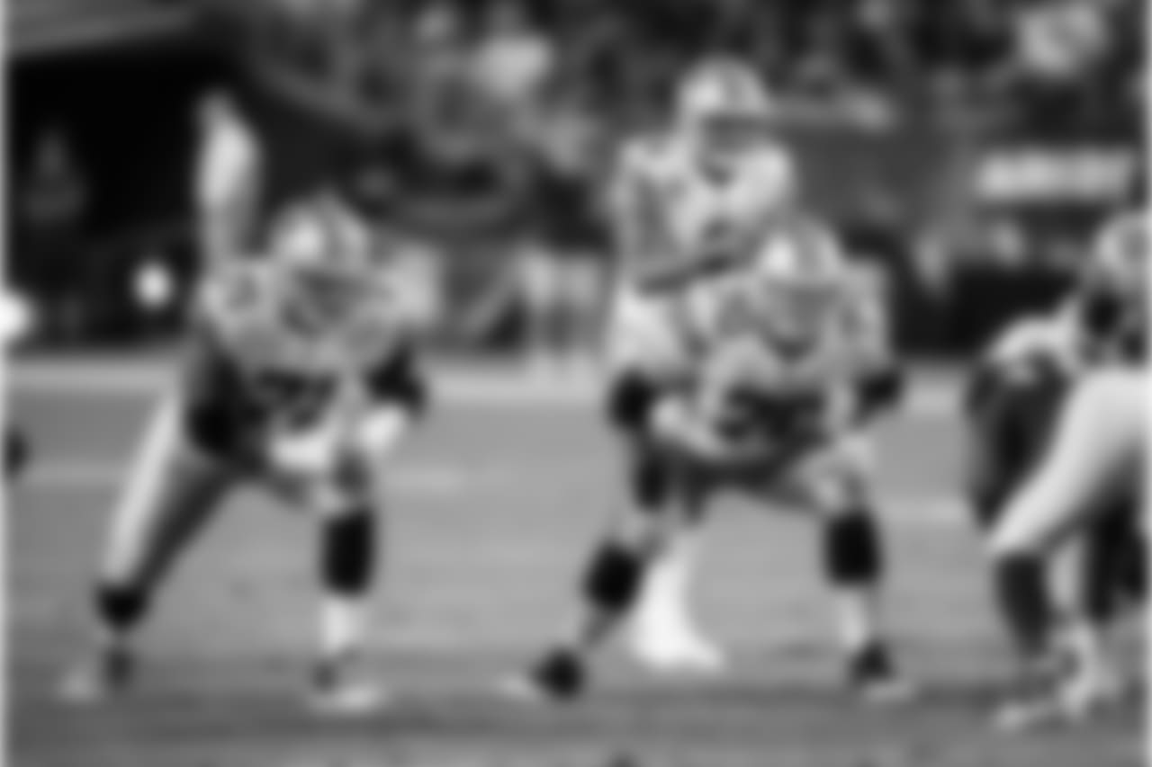 Dallas Cowboys offensive tackle La'el Collins (71) and Dallas Cowboys offensive guard Zack Martin (70) get set at the line of scrimmage during the 2017 NFL week 3 regular season football game against the Arizona Cardinals, Monday, Sept. 25, 2017 in Glendale, Ariz. The Cowboys won the game 28-17. (Paul Spinelli via AP)