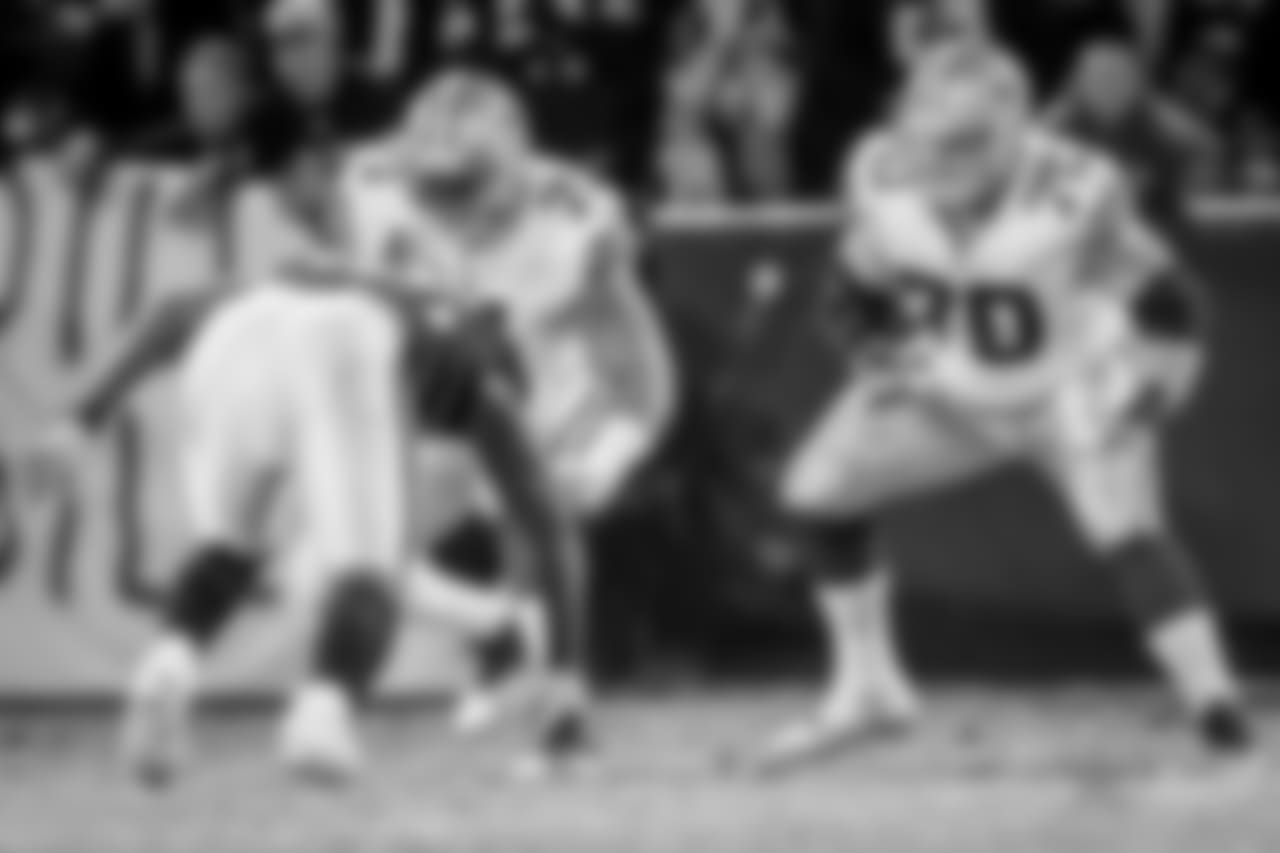 Dallas Cowboys offensive tackle La'el Collins (71) and guard Zack Martin (70) block during a week 15 NFL football game against the Oakland Raiders on Sunday, Dec. 17, 2017 in Oakland, Calif. Dallas won 20-17. (Aaron M. Sprecher via AP)