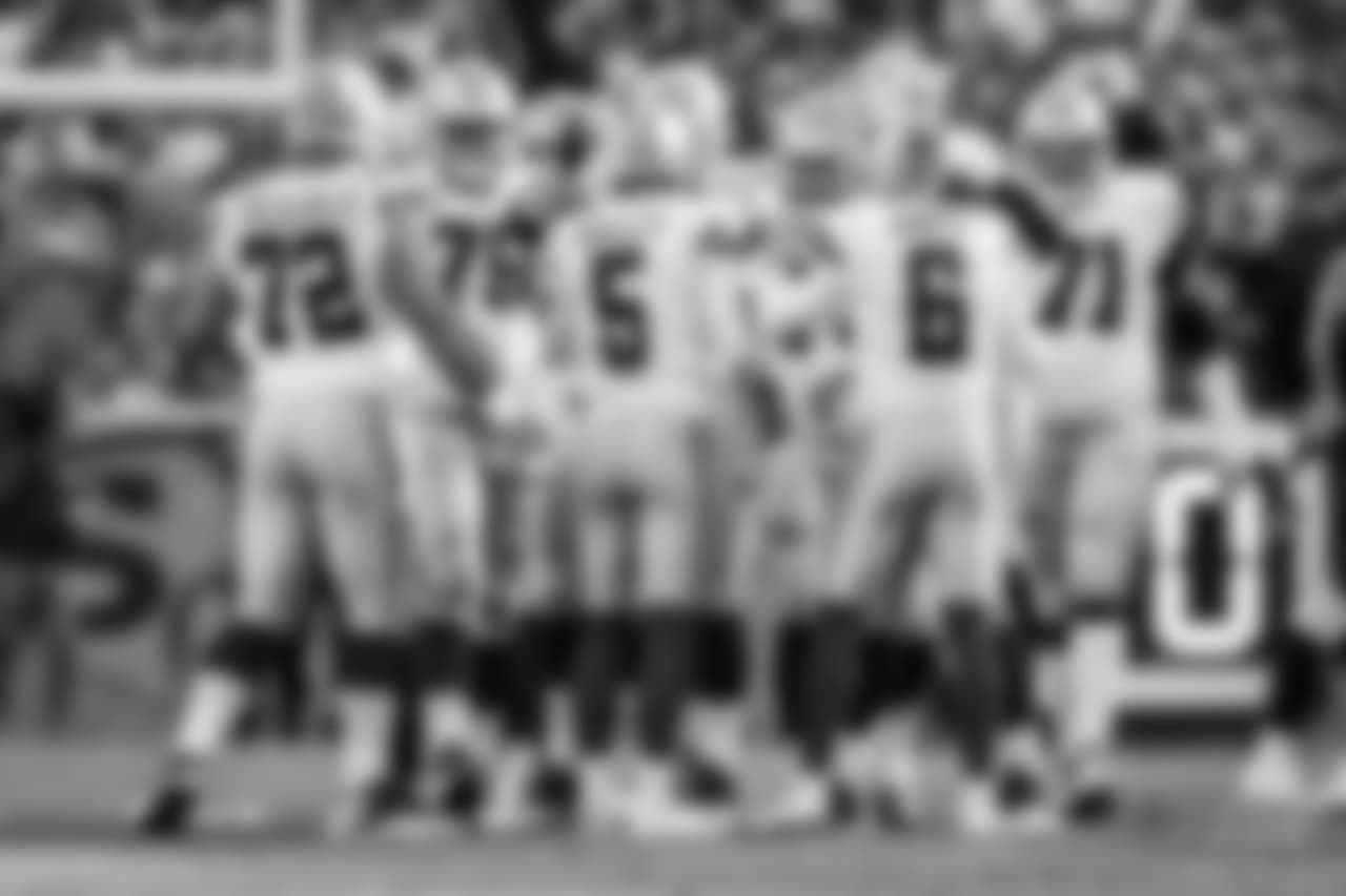 Dallas Cowboys kicker Dan Bailey (5), Dallas Cowboys punter Chris Jones (6) and the field goal unit celebrates during an NFL regular season football game against the Denver Broncos on Sunday, Sept. 17, 2017 in Denver. The Broncos won, 42-17. (Ric Tapia via AP)