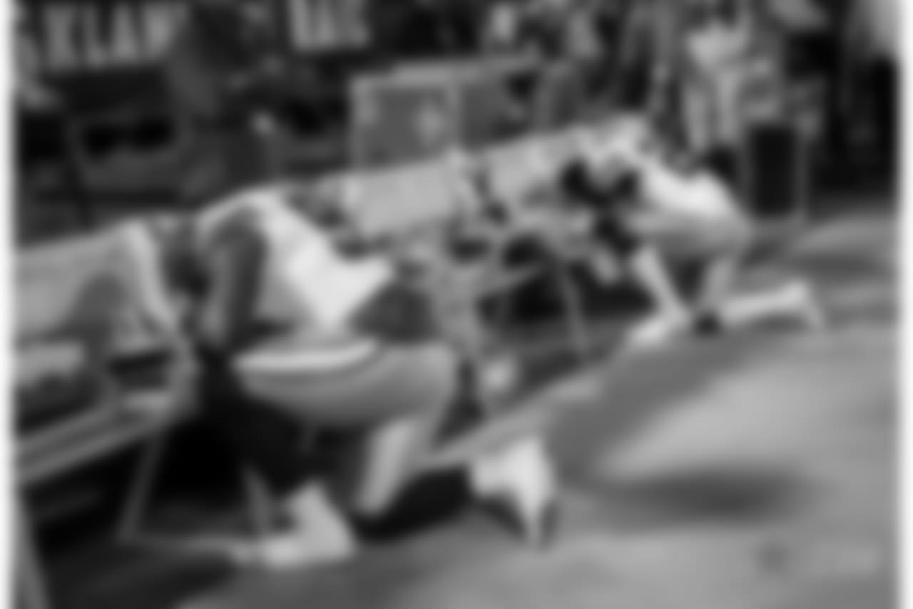Dallas Cowboys players kneel before an NFL football game against the Oakland Raiders in Oakland, Calif., Sunday, Dec. 17, 2017. (AP Photo/Eric Risberg)