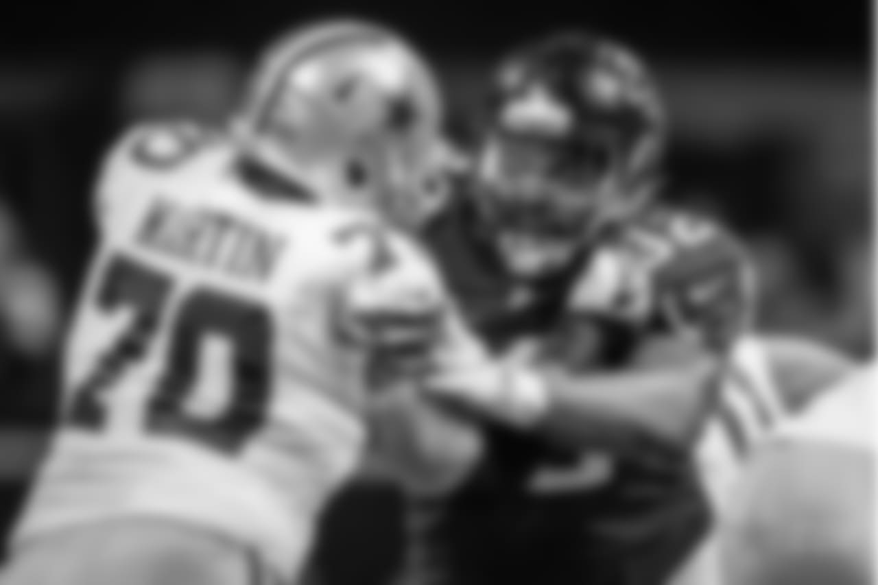Atlanta Falcons nose tackle Dontari Poe (92) runs into the backfield in front of Dallas Cowboys guard Zack Martin (70) during a week 10 NFL football game on Sunday, Nov. 12, 2017, in Atlanta. Atlanta won 27-7. (Aaron M. Sprecher via AP)