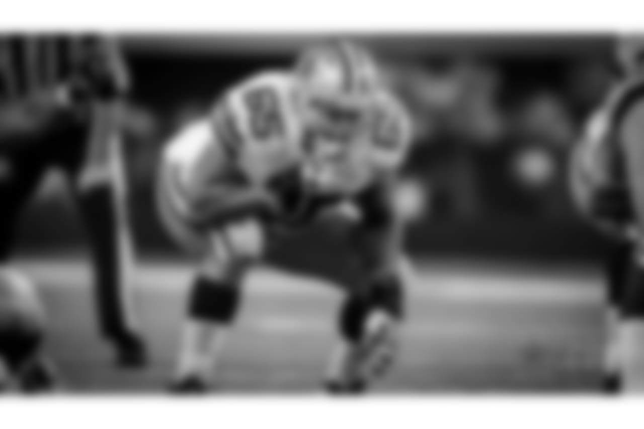 Dallas Cowboys guard Ronald Leary (65) prepares to block on the line of scrimmage during an NFL football NFC divisional playoff game against the Green Bay Packers on Sunday, Jan. 15, 2017, in Arlington, Texas. Green Bay won 34-31. (Peter Read Miller via AP)