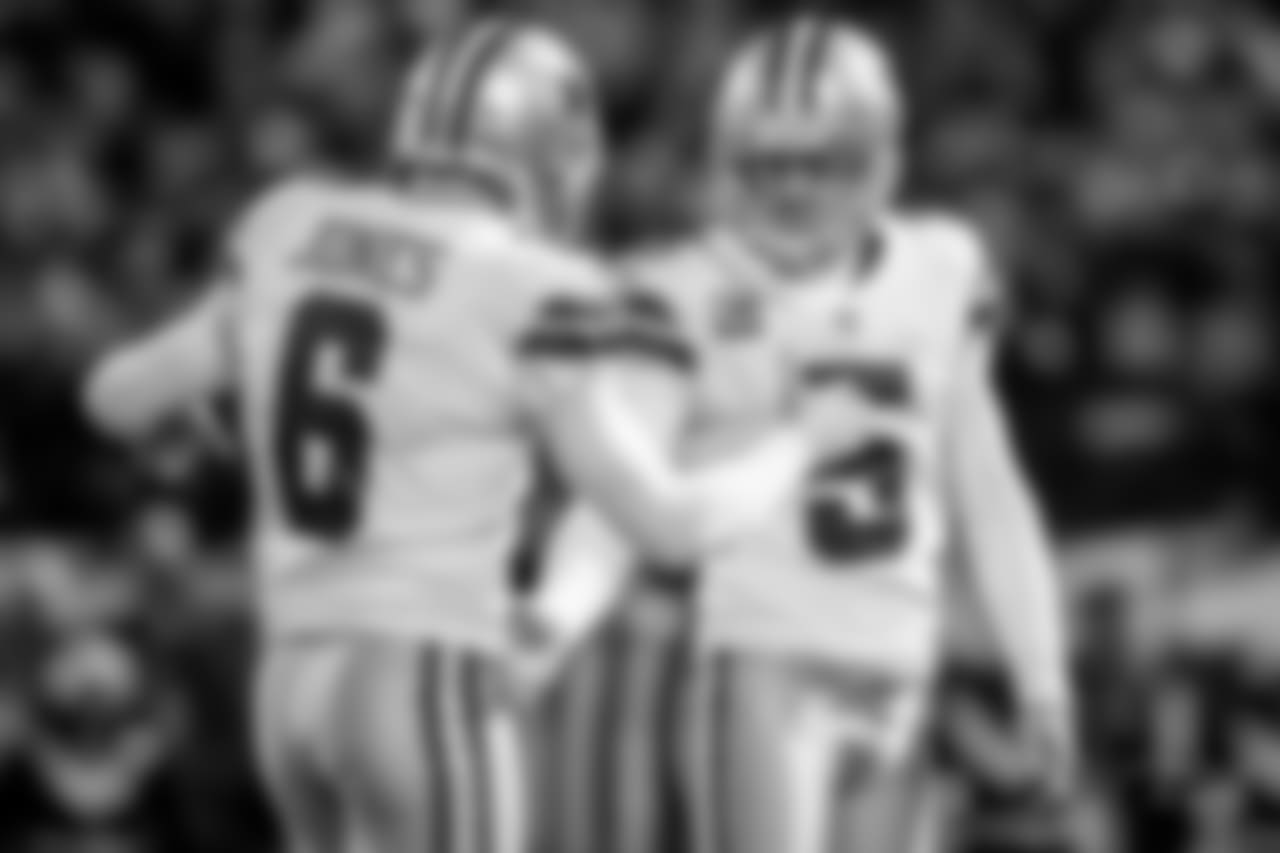 Dallas Cowboys place kicker Dan Bailey (5) celebrates with punter Chris Jones (6) during a week 15 NFL football game against the Oakland Raiders on Sunday, Dec. 17, 2017 in Oakland, Calif. Dallas won 20-17. (Aaron M. Sprecher via AP)