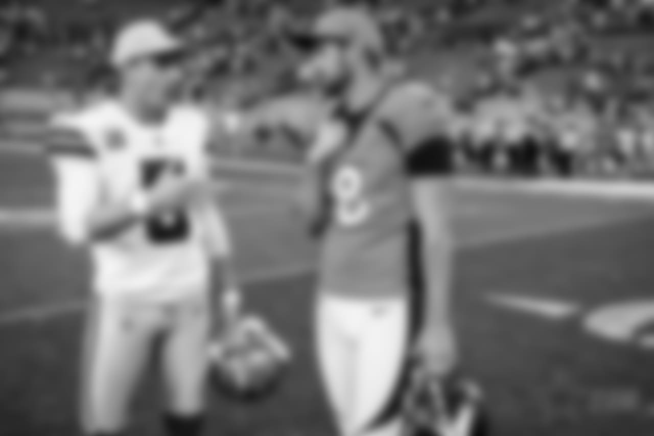 Dallas Cowboys placekicker Dan Bailey (5) chats with Denver Broncos placekicker Brandon McManus (8) after Denver defeated Dallas 42-17 in the NFL game at Sports Authority Field in Denver ,Colo. September 17, 2017. (Photo via Eric Bakke)