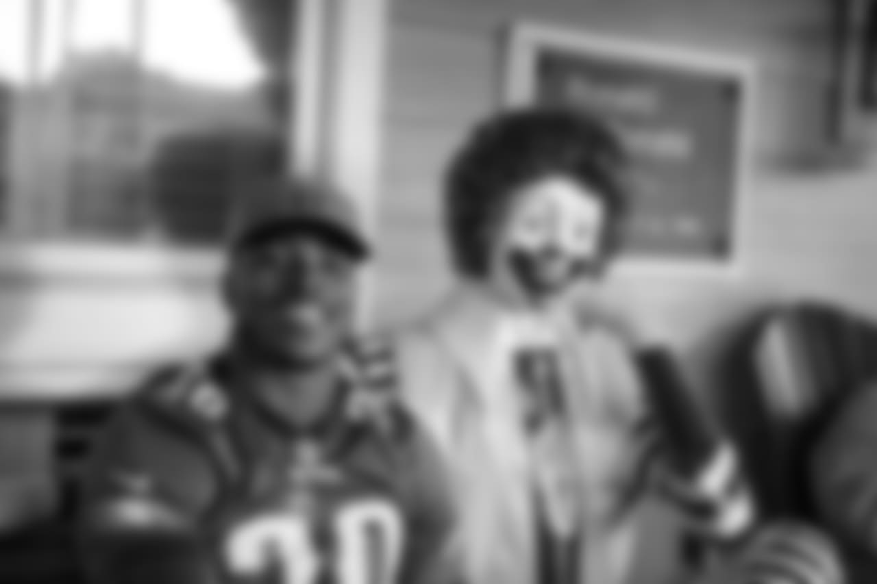 RB Corey Clement hangs out with Ronald McDonald.