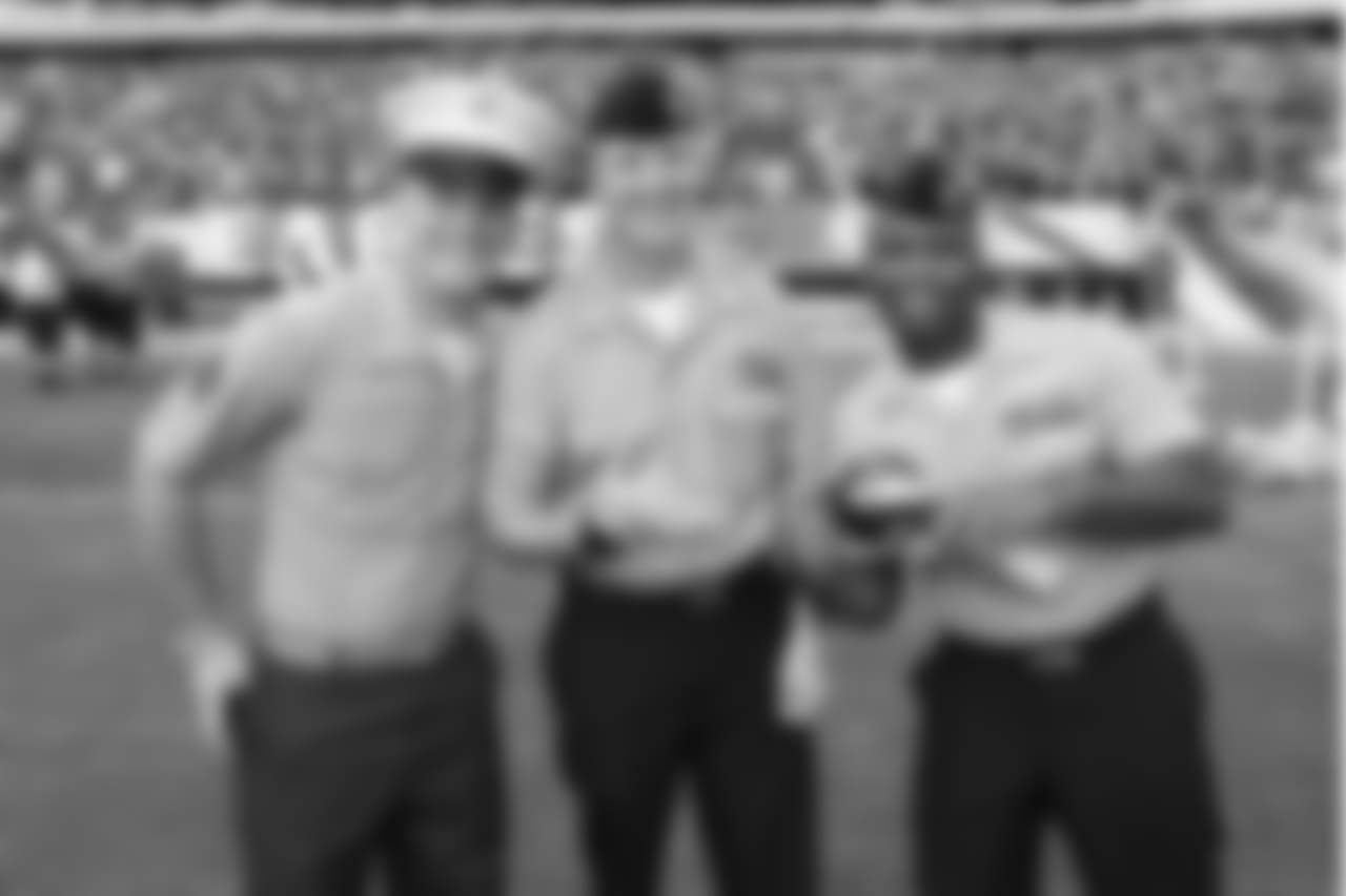 Soldiers pose for a photo on the field during public practice.