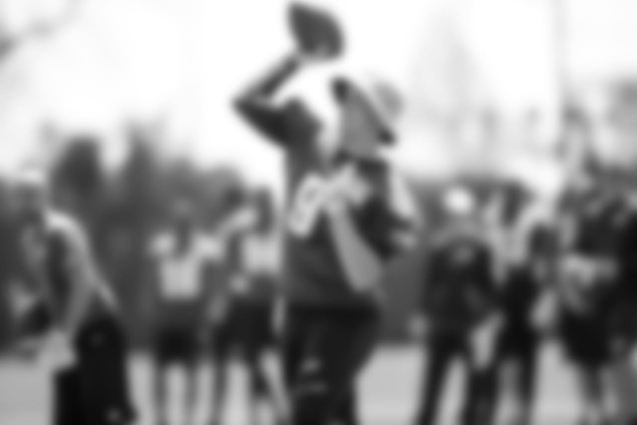 QB Nick Foles throws during practice.