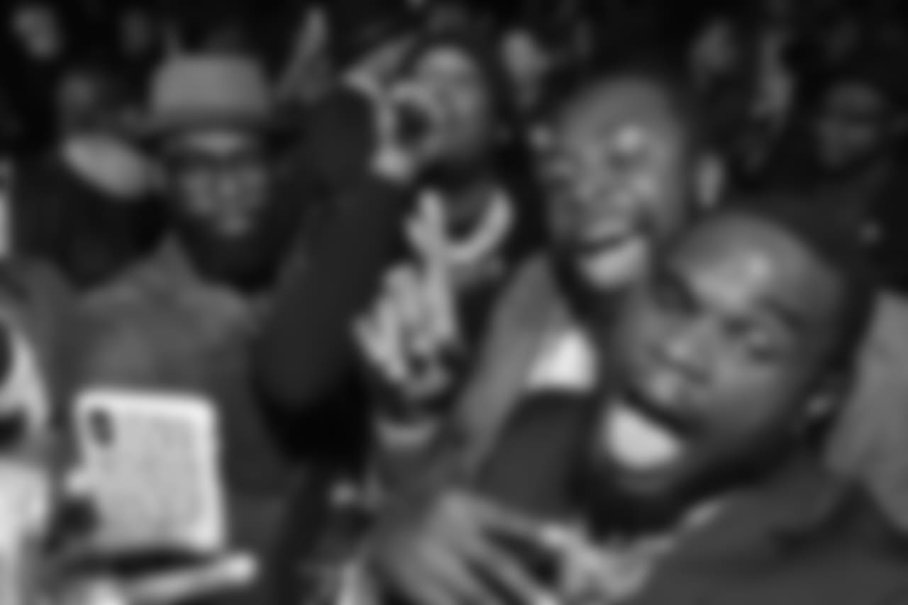 Players celebrate with a performance by rapper Meek Mill
