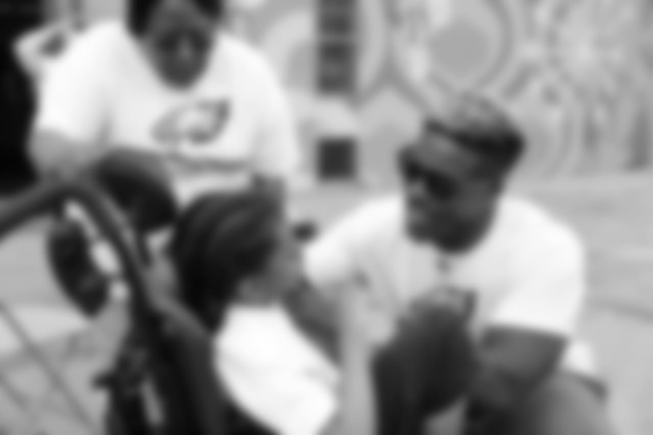 RB Corey Clement meets with one of the students