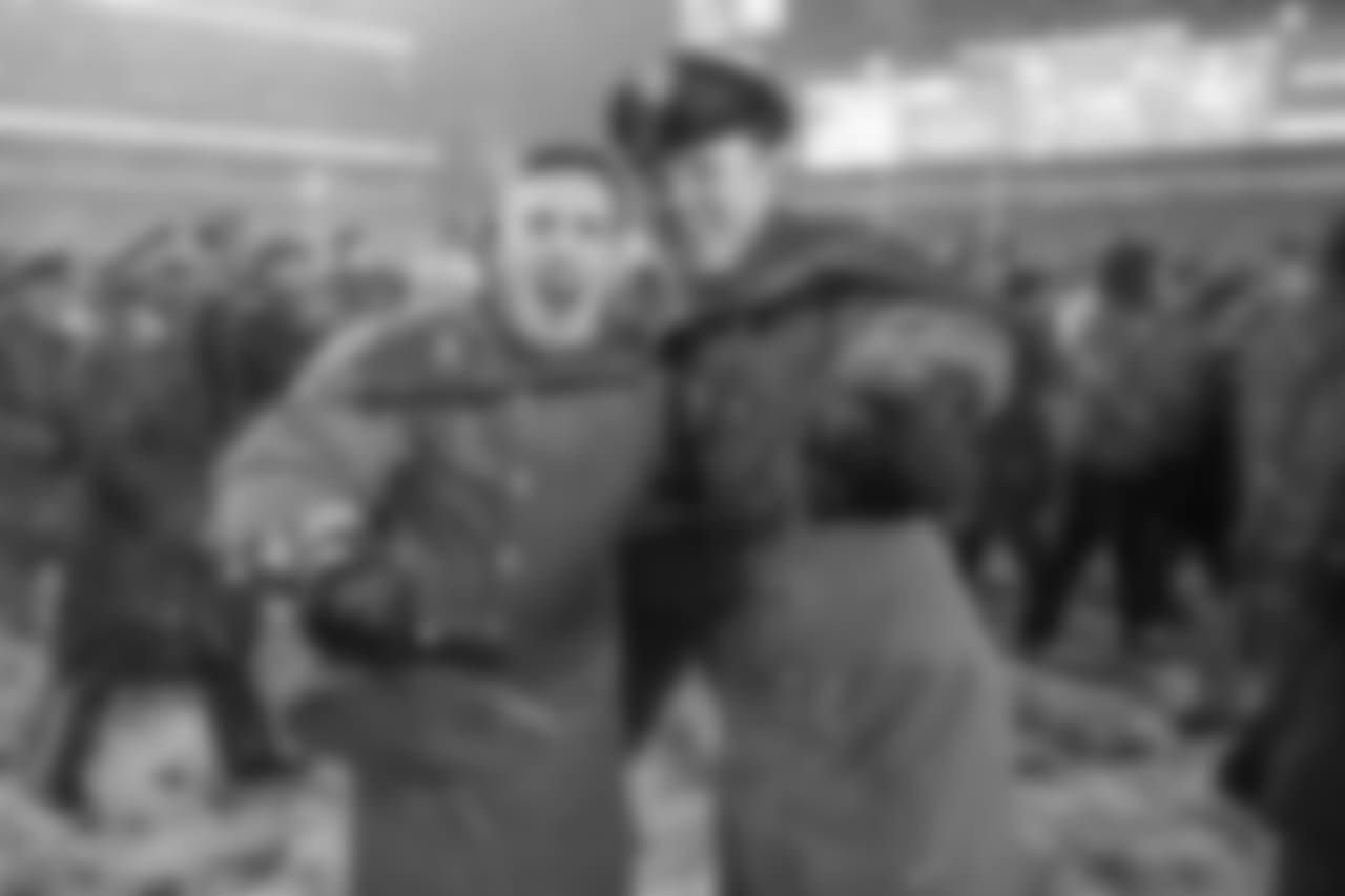 A couple of Army cadets celebrate the win.
