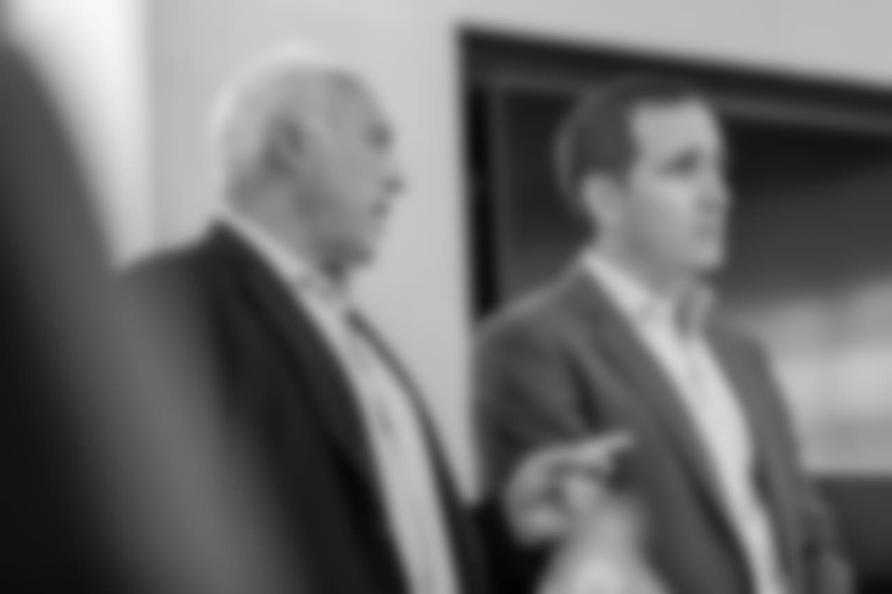 Jeffrey Lurie speaking to Howie Roseman.