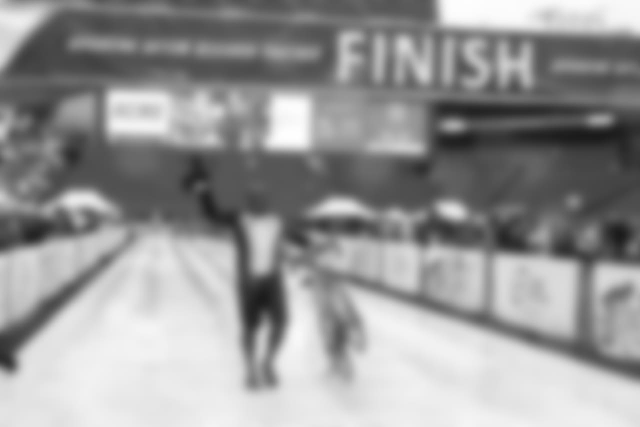 Quintin Mikell crosses the finish line.