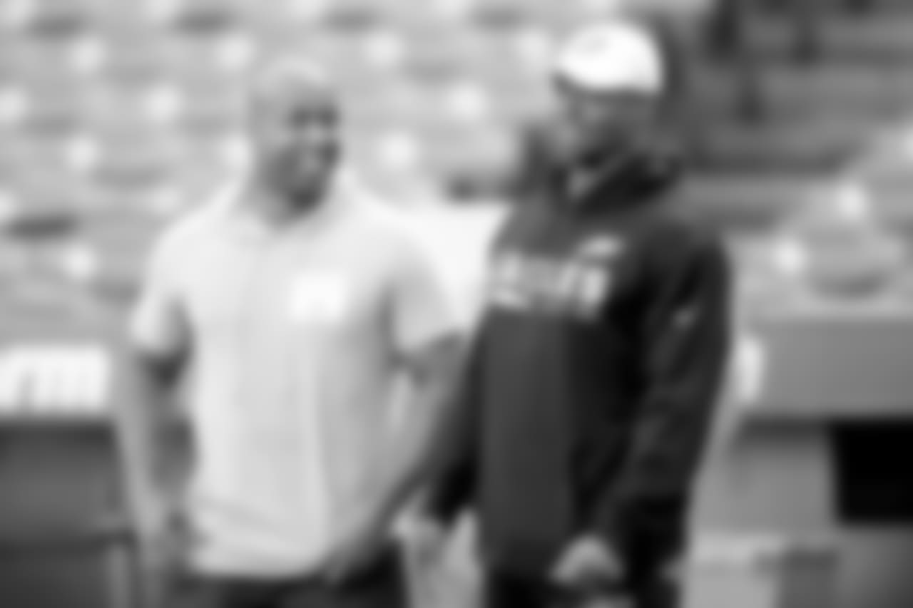 Rashard Cook and Brian Dawkins