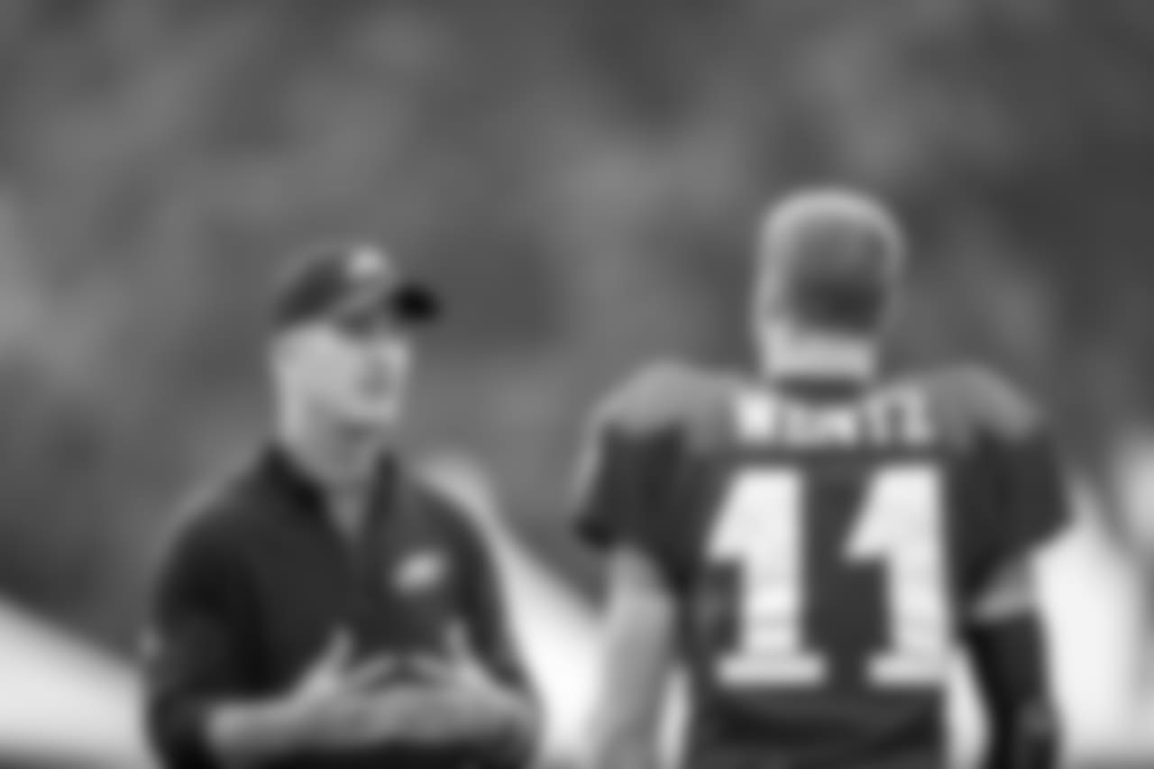 Offensive coordinator Frank Reich and QB Carson Wentz