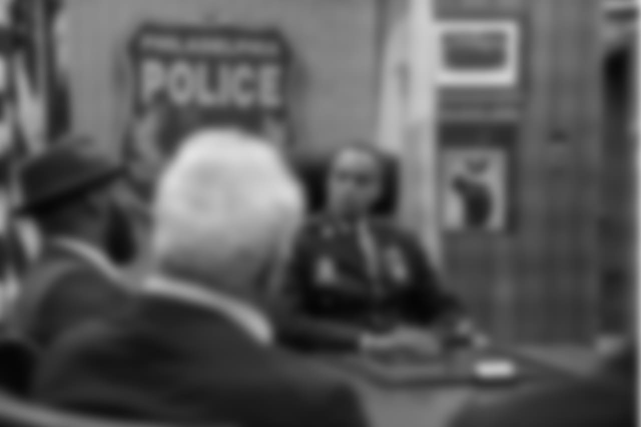 Malcolm Jenkins speaks to Ross Jr. and Eagles Chairman and CEO Jeffery Lurie at the Philadelphia Police Department.