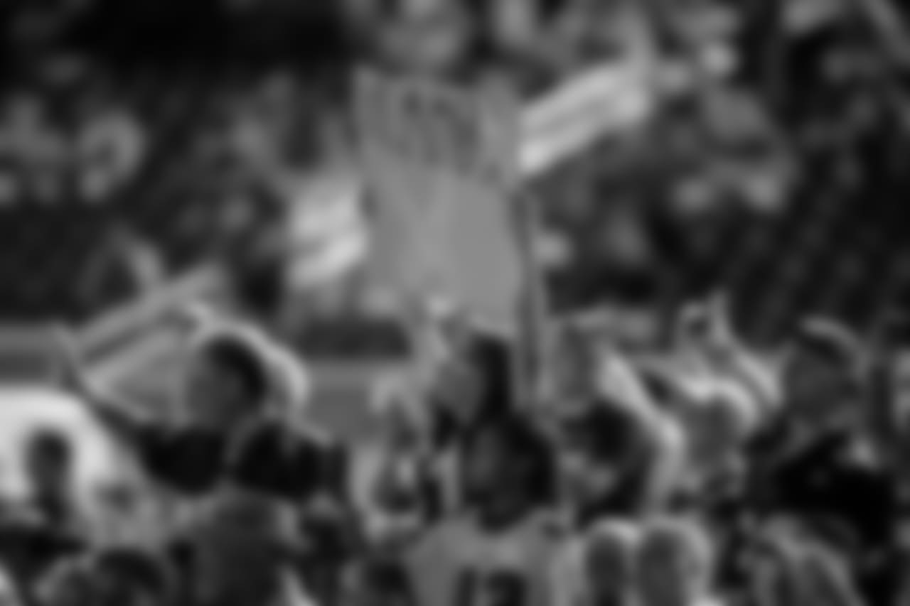 An Eagles fan holds up a Weapon X sign