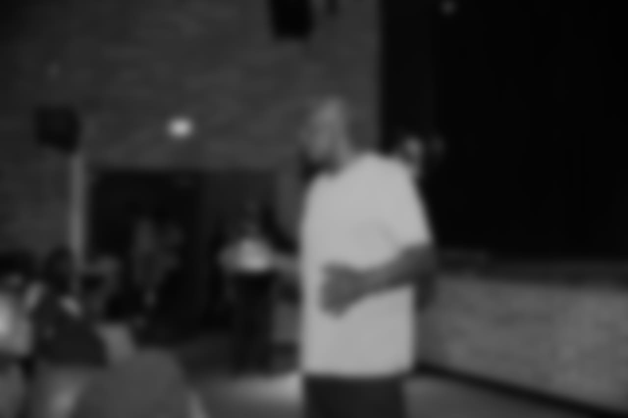 Harold Carmichael lends some words of advice to the Raines students