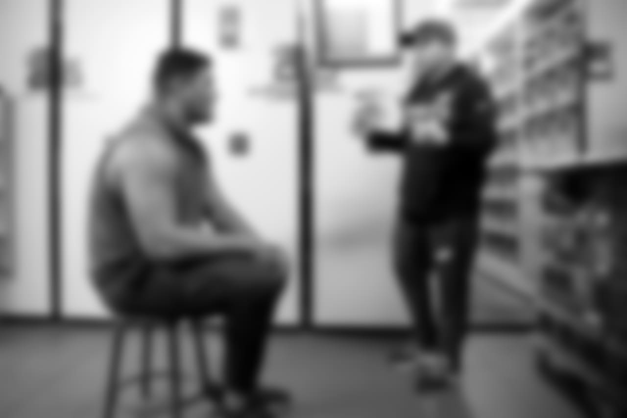 Mailata weighs his facemask options with director of equipment operations Greg Delimitros.