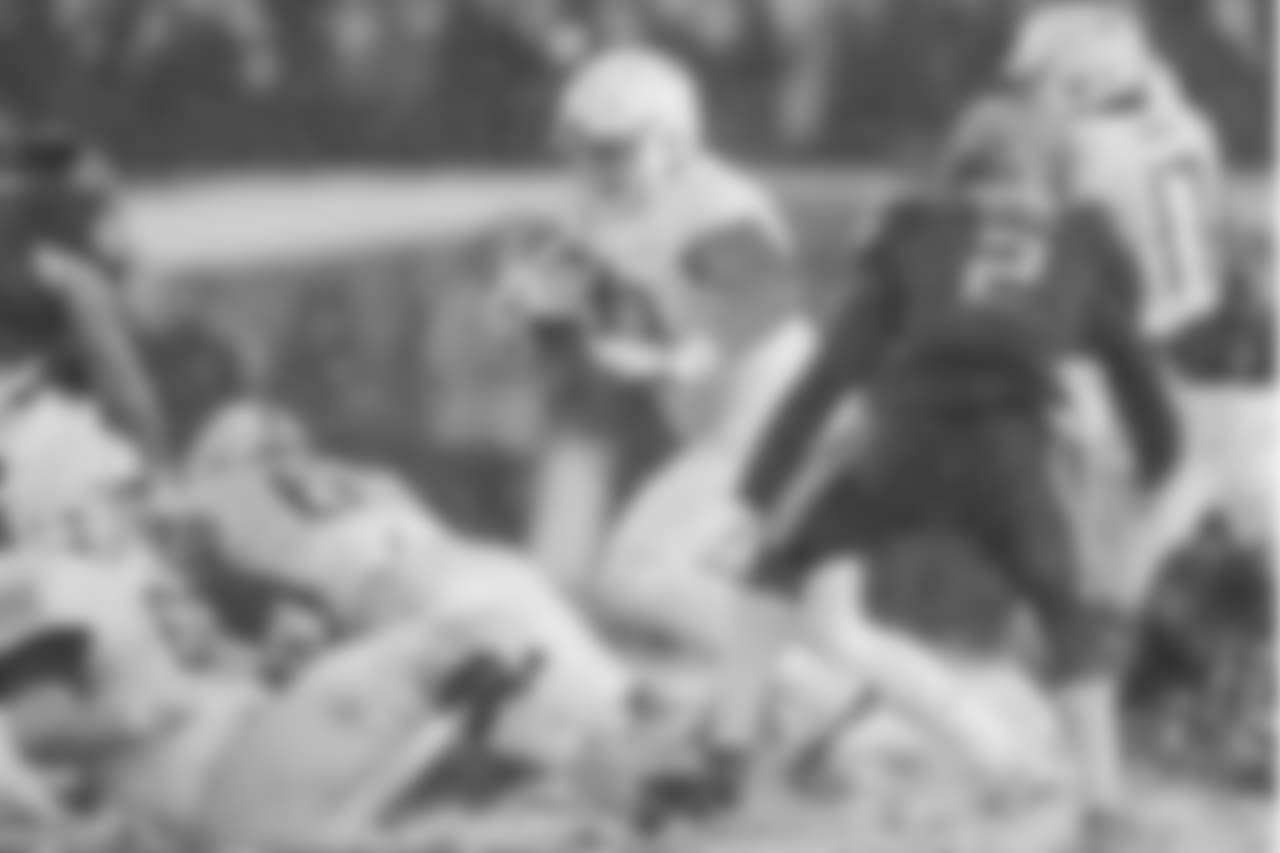 Army RB Darnell Woolfolk runs through the Navy defense.
