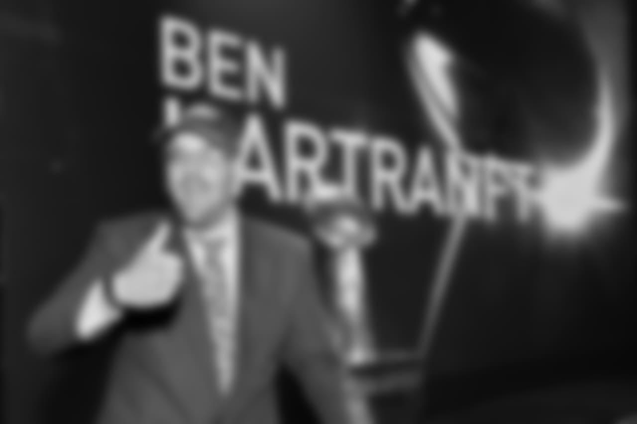 Ben Hartranft, the Eagles' Autism Ambassador and a top Eagles Autism Challenge fundraiser, brings the Vince Lombardi Trophy into the ceremony