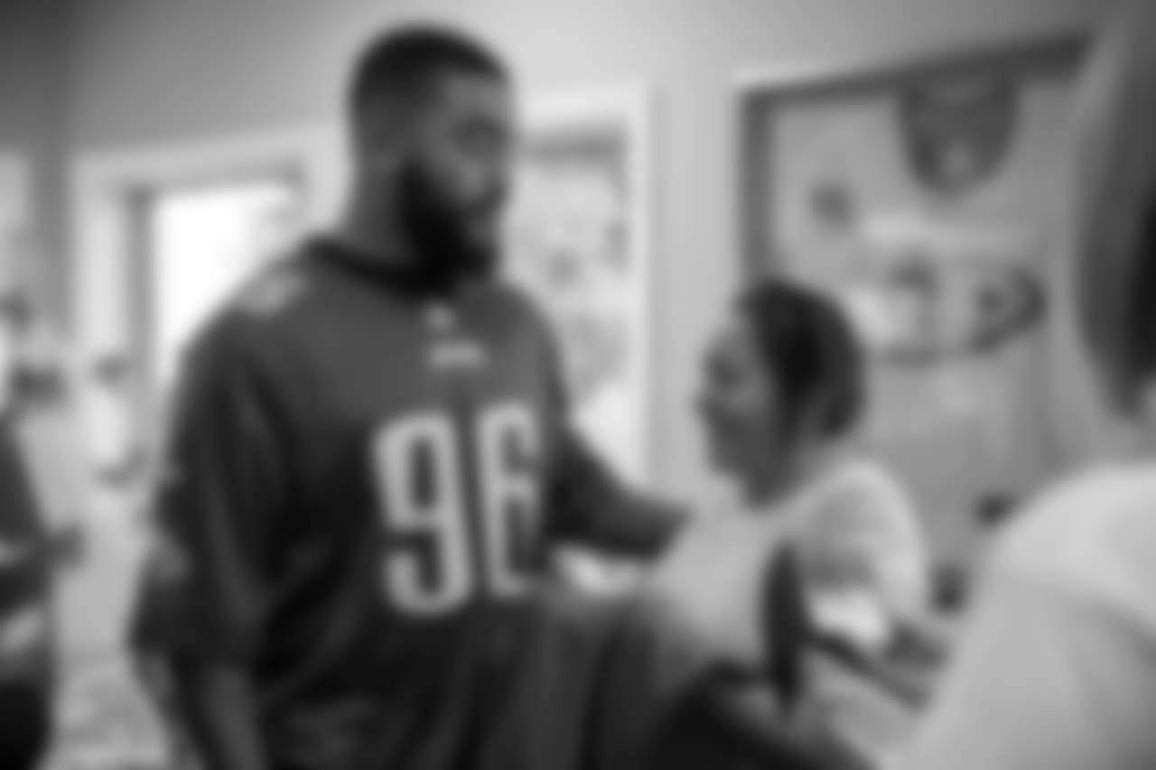 DE Derek Barnett meets a parent inside the Orange County Ronald McDonald House.