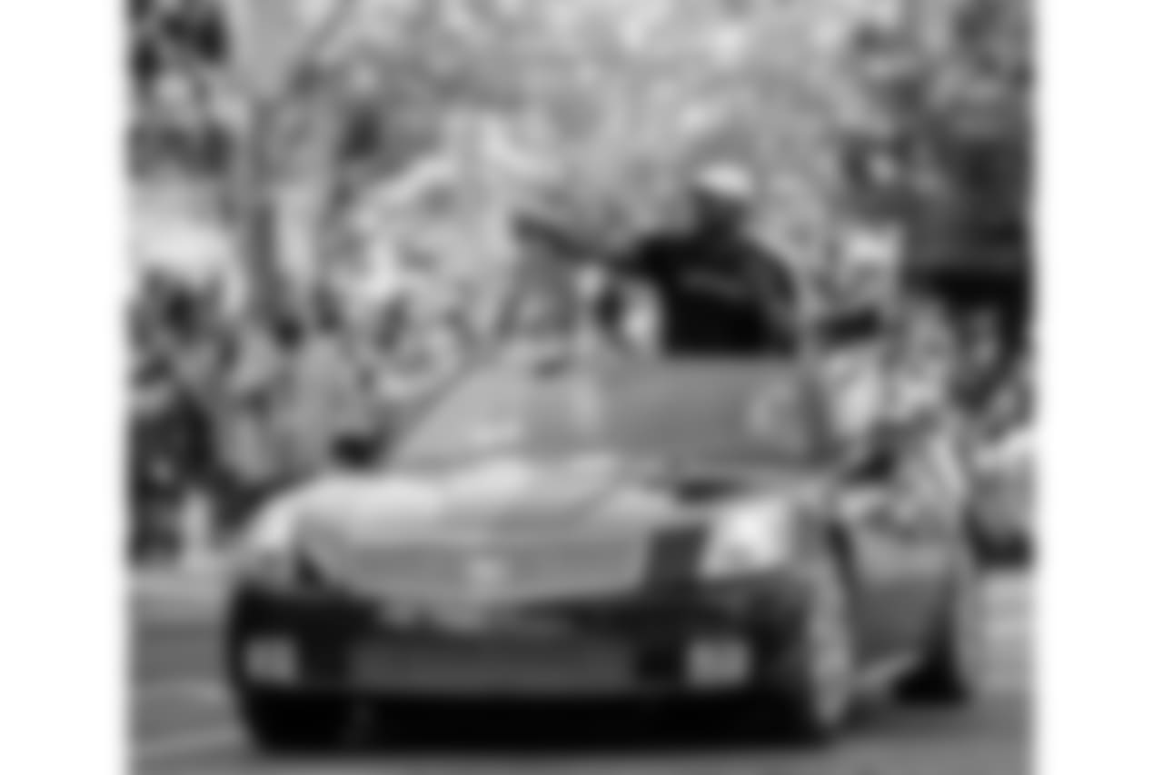 Brian Dawkins rides in his car along the parade route