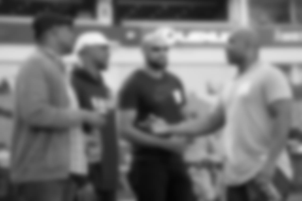 Mark Seay, Brian Dawkins, Hank Baskett and Rashard Cook