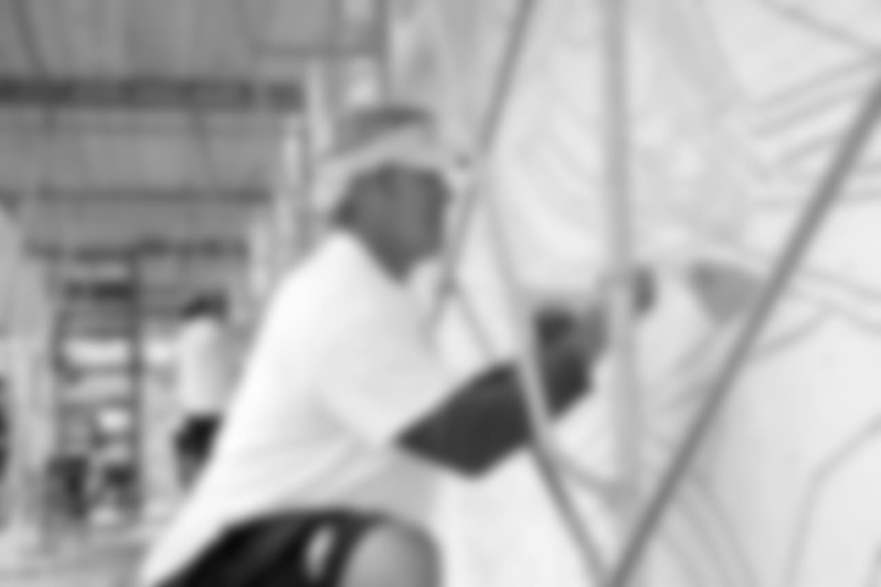 Coach Doug Pederson painting the mural.